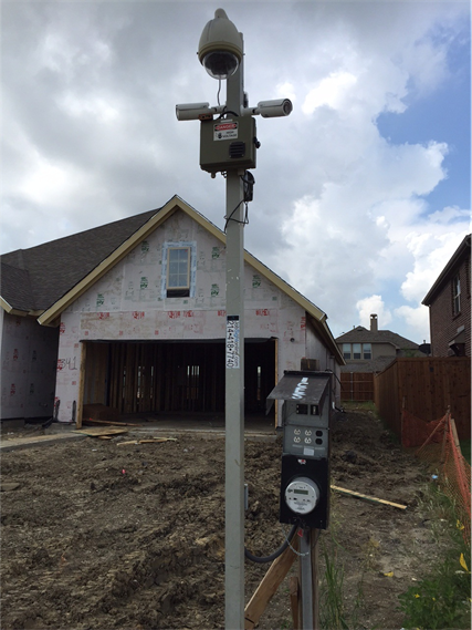 Camera unit in front of home under construction